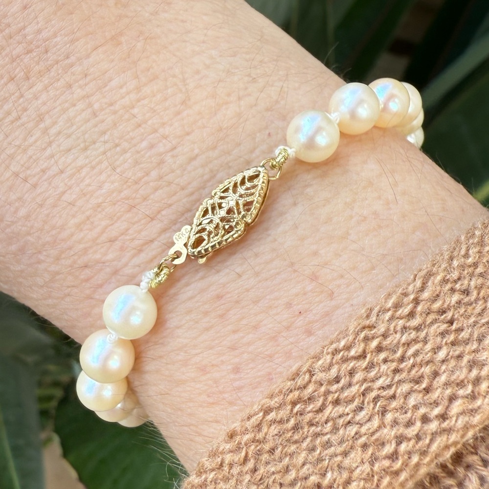 Solid 14K gold top quality 7mm cultured freshwater pearl bracelet